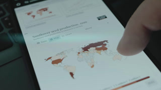 Sunflower seed production since 1961 to 2021 on world map, time-lapse on smartphone screen