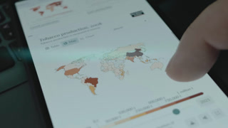 Tobacco production since 1961 to 2021 on world map, time-lapse on mobile phone screen