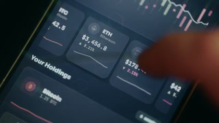 Person views various cryptocurrency assets, their current market performance