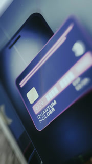 Futuristic payment card illustration labeled Quantum Holder in vertical orientation