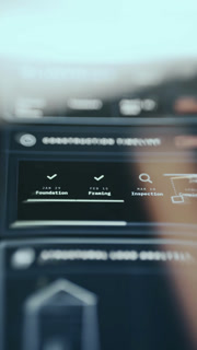 Close up view of screen with Construction timeline visualization including steps from Foundation to Completion