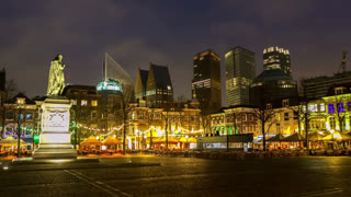 The Hague Cityscape At Night With Statue And Illuminated Buildings Time-Lapse