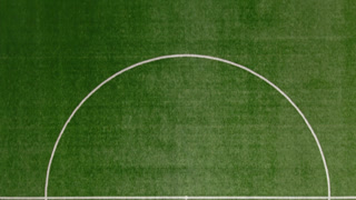 Football or soccer field with border lines, top view