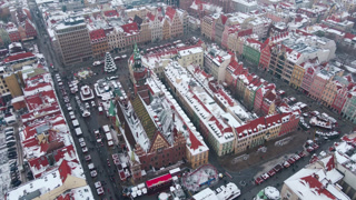 Aerial view of snowy European town during winter holidays