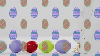 Glossy eggs rolling in from right, nudging group left and forming loose row under cartoon overlay