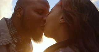 Close-up of couple kissing each other on a sunny day 4k