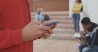 Students on their phones in high school 
