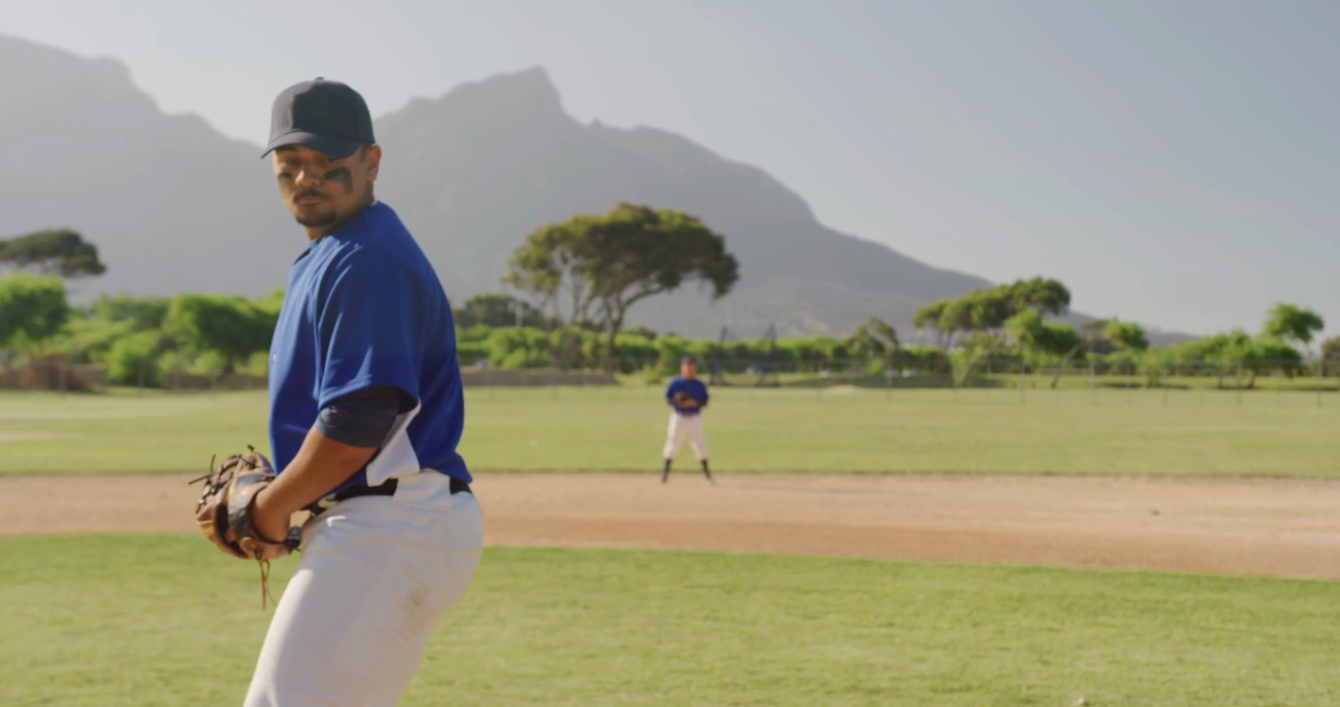 Baseball player throwing a ball during a match Stock Video Footage 00