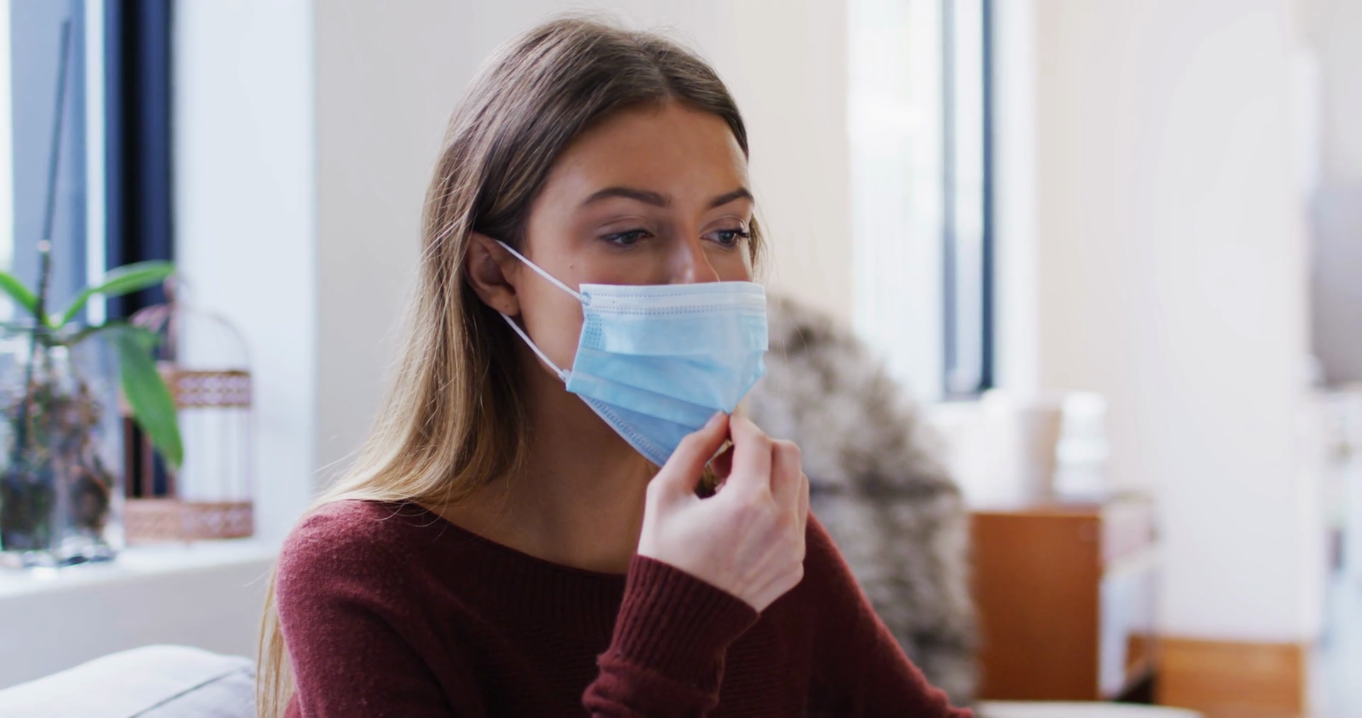 Woman pulling down face mask to breathe Stock Video Footage 0018 SBV
