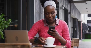 African american sitting in a cafe