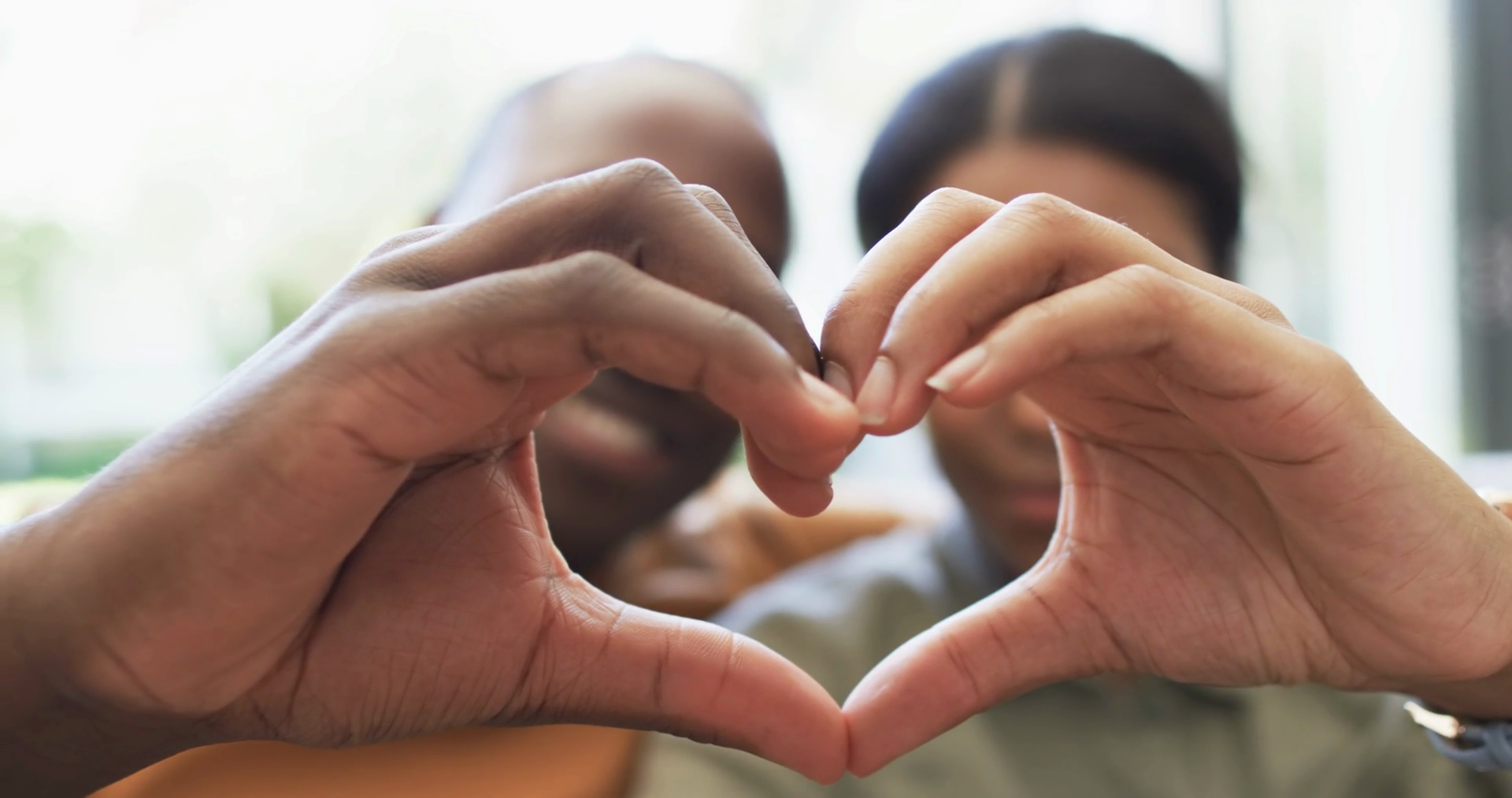 A Diverse Couple Forms Heart Shape With Hands Stock Footage SBV ...