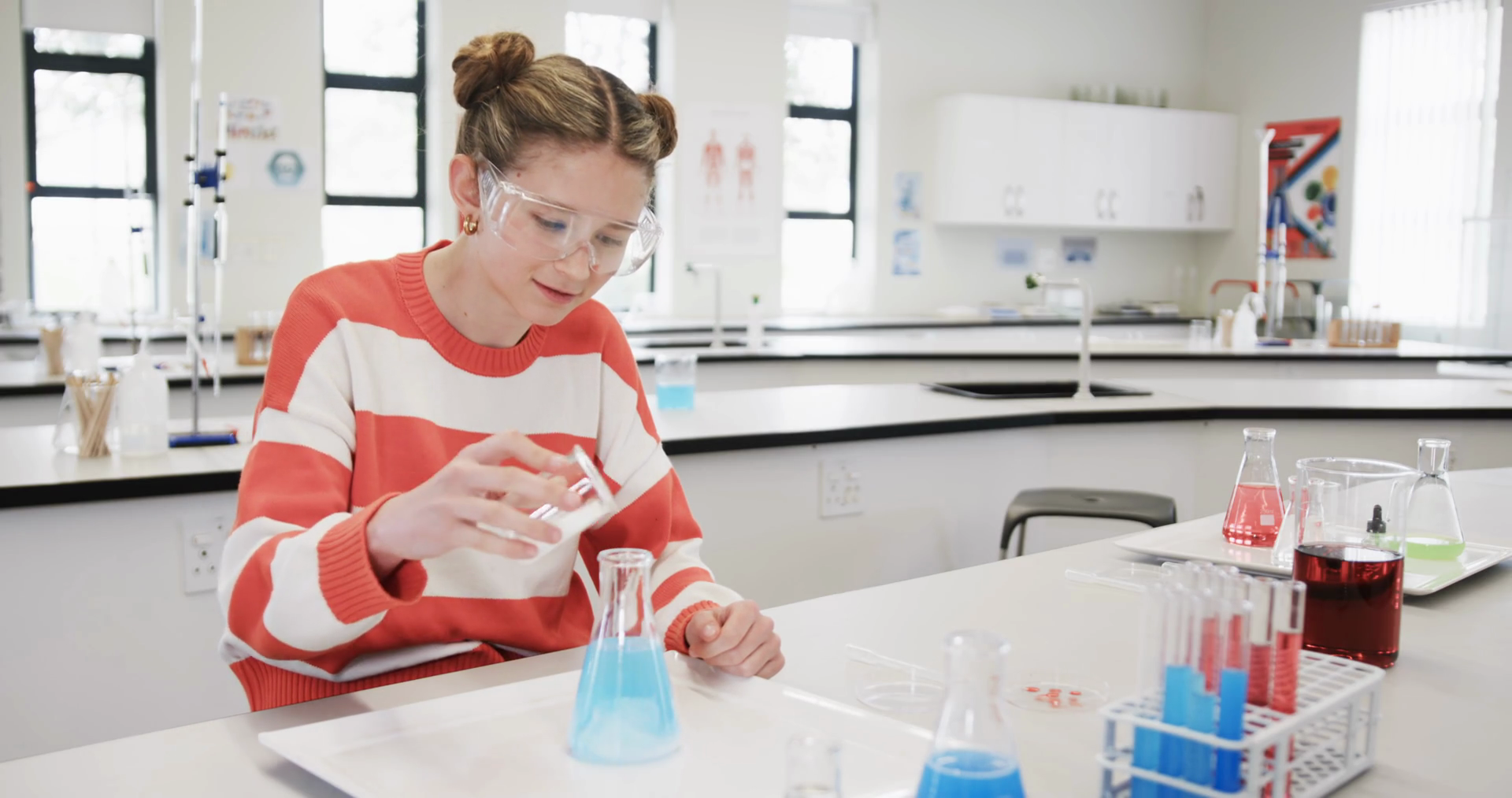 Young Girl Conducting Science Experiment In Stock Footage SBV-352265710 ...