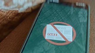 Fake News, Newspaper with Red circle stop sign, presentation