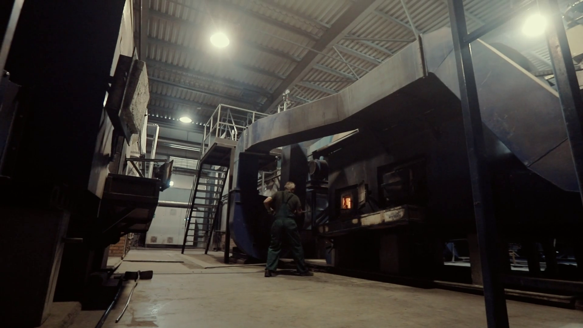 Modern Boiler Room On Production. Powerful Ventilation System. Stoker Removes Burning Coals From Modern Boiler Room On Production. Powerful Ventilation System. Stoker Removes Burning Coals From