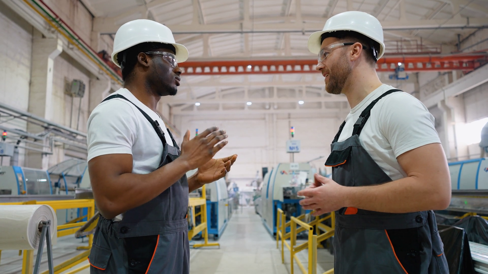 Two Diverse Factory Workers Talking Stock Footage SBV-353043871 ...