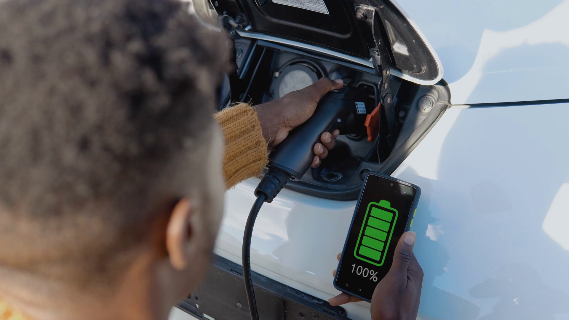 A Dark-skinned Male Driver Connects Electric Stock Footage SBV ...