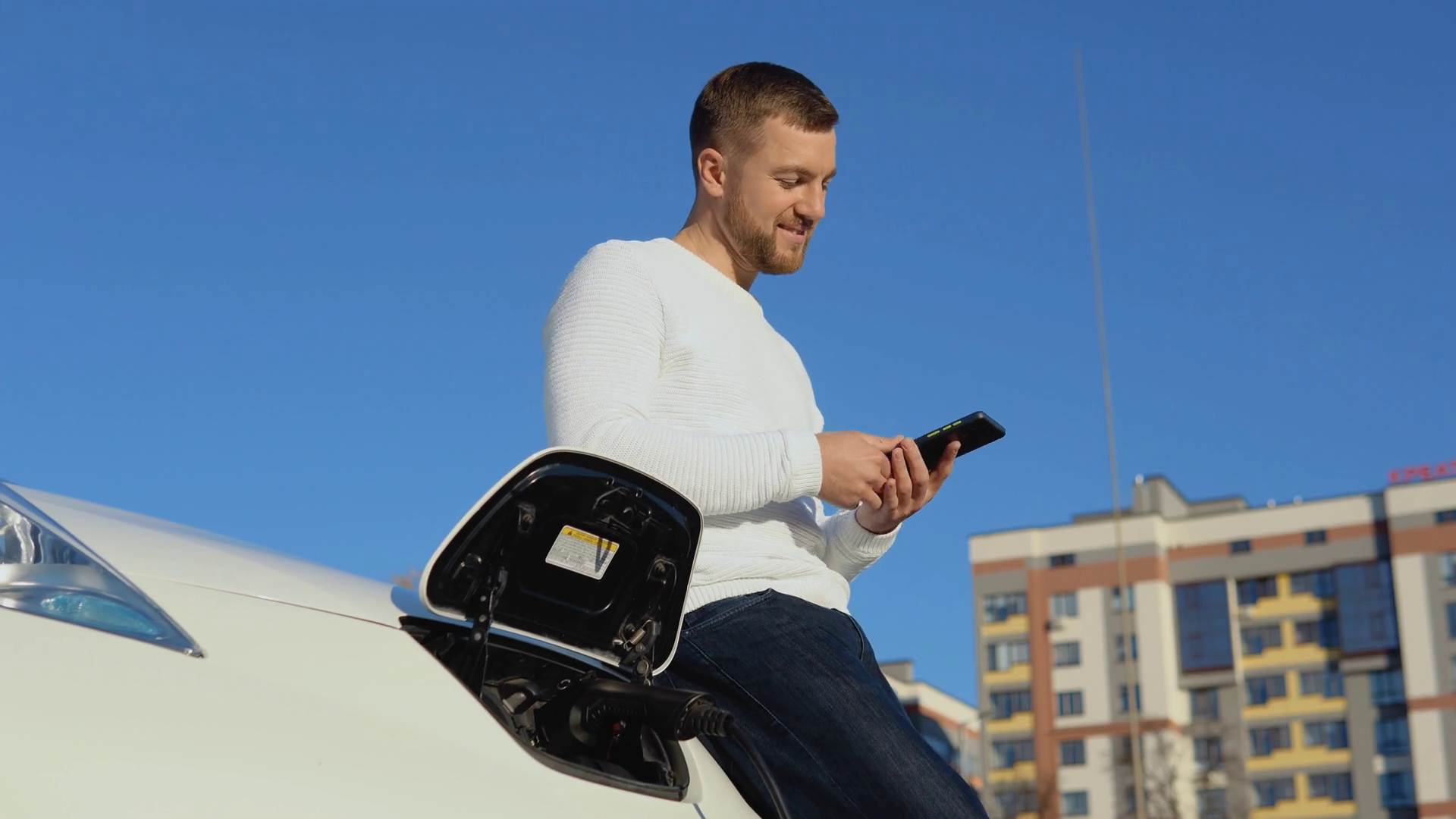 A Male Driver Connects Electric Car To Power Stock Footage SBV ...