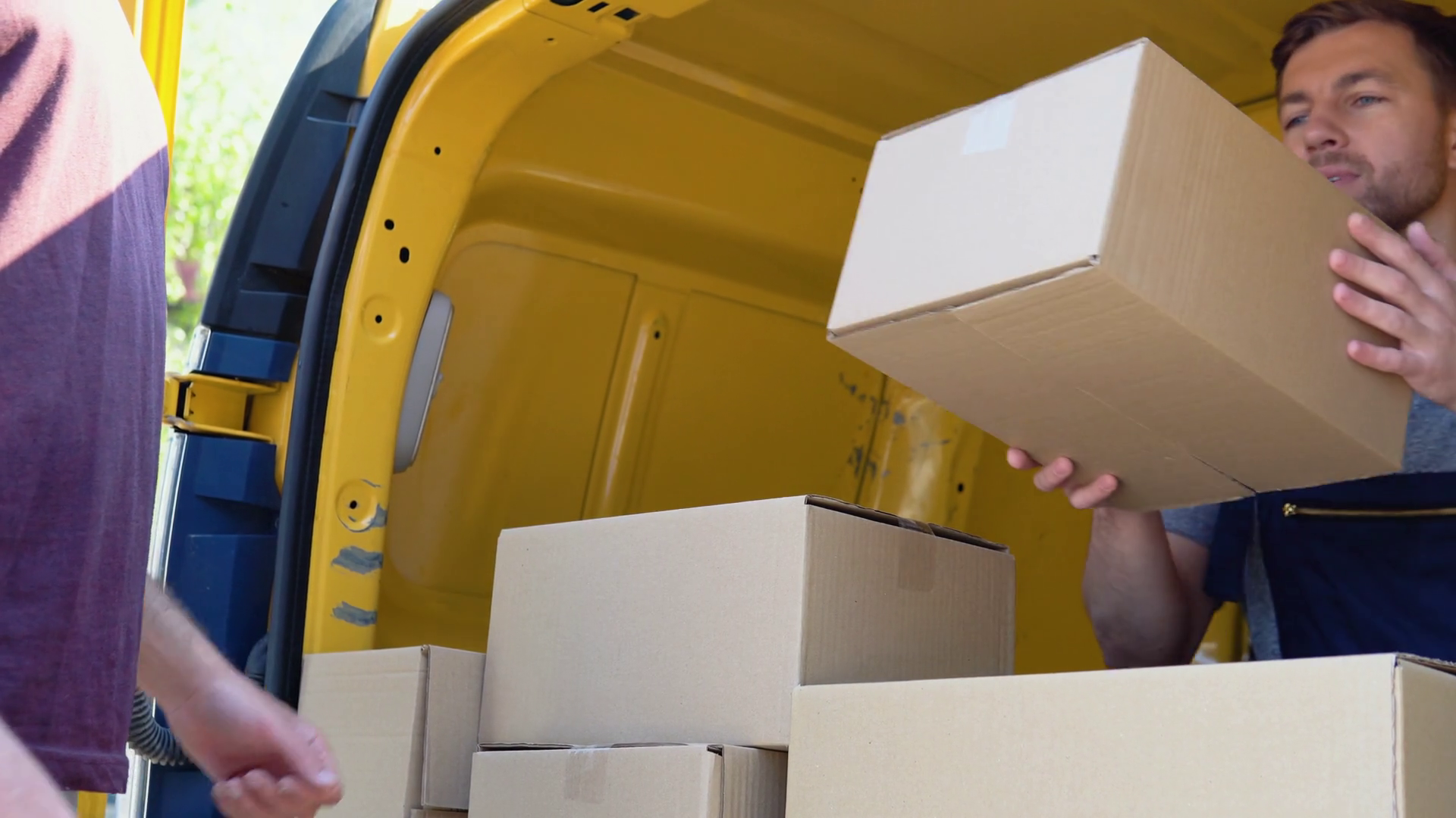 Young Mailman Courier Is Delivering Parcel Stock Footage SBV-352376527 ...