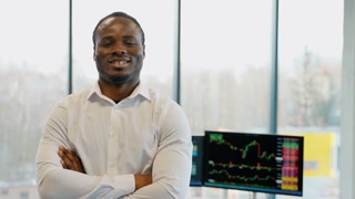 Portrait of african american trader at office