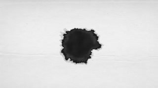 Ink Drop Bleed On Grain Textured Paper Background