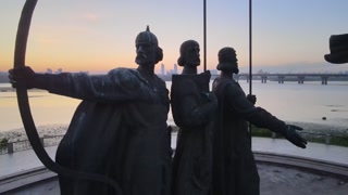 Aerial view of Kiev, Ukraine: Monument to the founders of the city in the morning at sunrise