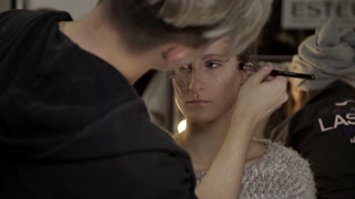 Backstage fashion show. Preparations for the demonstration