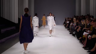 A group of models on the catwalk during a fashion show in Kyiv, Ukraine