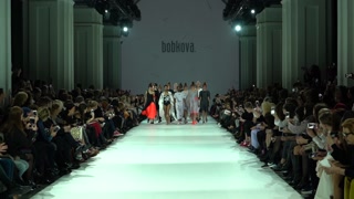 A group of models on the catwalk during a fashion show in Kyiv, Ukraine
