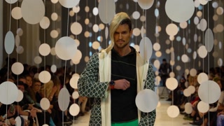 Demonstration of men's clothing by a male model on the catwalk during a fashion show in Kyiv, Ukraine