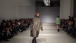 Male and female models on the catwalk during a fashion show in Kyiv, Ukraine