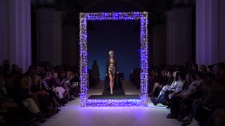 Model on the catwalk during a fashion show in Kyiv, Ukraine