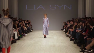 Model on the catwalk during a fashion show in Kyiv, Ukraine