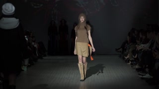 Model on the catwalk during a fashion show in Kyiv, Ukraine