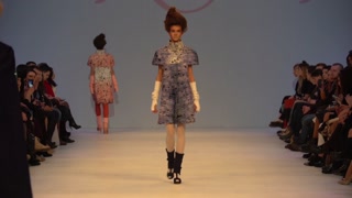 Model on the catwalk during a fashion show in Kyiv, Ukraine