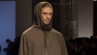 Male model on the catwalk during a fashion show in Kyiv, Ukraine