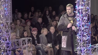 Male model on the catwalk during a fashion show in Kyiv, Ukraine