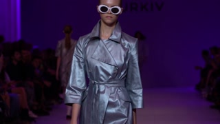 Woman model on the catwalk during a fashion show in Kyiv, Ukraine