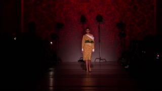 Woman model on the catwalk during a fashion show in Kyiv, Ukraine