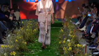 Woman model on the catwalk during a fashion show in Kyiv, Ukraine