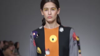 Ukraine, Kyiv : model demonstrates clothes at a fashion show, slow motion