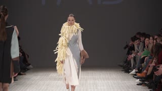 Ukraine, Kyiv : model demonstrates clothes at a fashion show, slow motion
