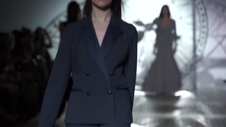 Ukraine, Kyiv : model demonstrates clothes at a fashion show, slow motion