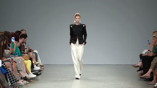 Ukraine, Kyiv : model demonstrates clothes at a fashion show, slow motion