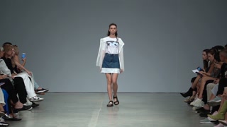 Model demonstrates clothes at a fashion show in Kyiv, Ukraine, slow motion