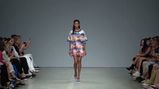 Model demonstrates clothes at a fashion show in Kyiv, Ukraine, slow motion