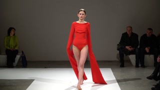 Model demonstrates clothes at a fashion show in Kyiv, Ukraine, slow motion