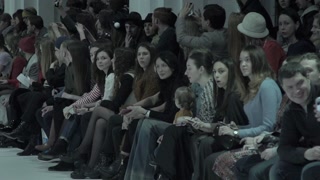 Model demonstrates clothes at a fashion show in Kyiv, Ukraine, slow motion