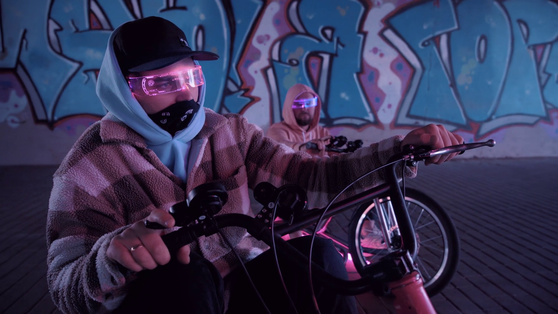 Urban Cyclists Riding In Neon Lights Stock Footage SBV-352368163 ...