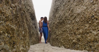 WS Couple kissing between boulders, Cape Town, South Africa