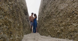WS Couple kissing between boulders, Cape Town, South Africa